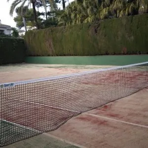 Construcción de cancha de tenis